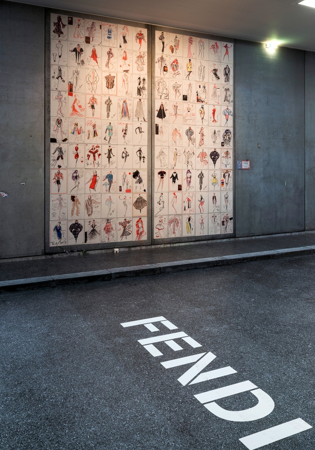 Fendi sketches against a printed Berlin cement street scene