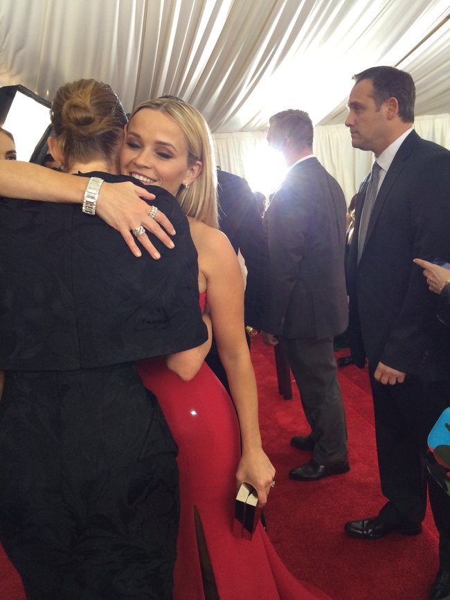 Reese Witherspoon in Jason Wu gives Stella McCartney a hug