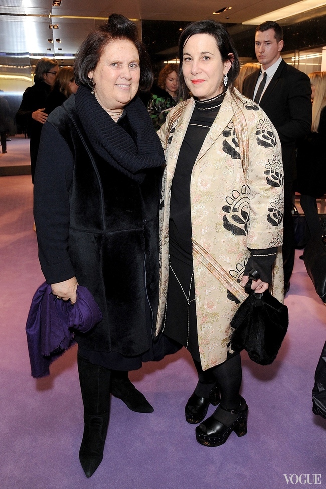 Suzy Menkes with Arianne Phillips (right, wearing Prada) at Prada's "The Iconoclasts" installation in London last February
