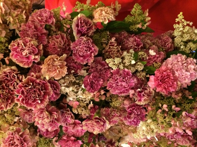 The floral backdrop at the latest Oscar de la Renta show, photographed by Suzy Menkes