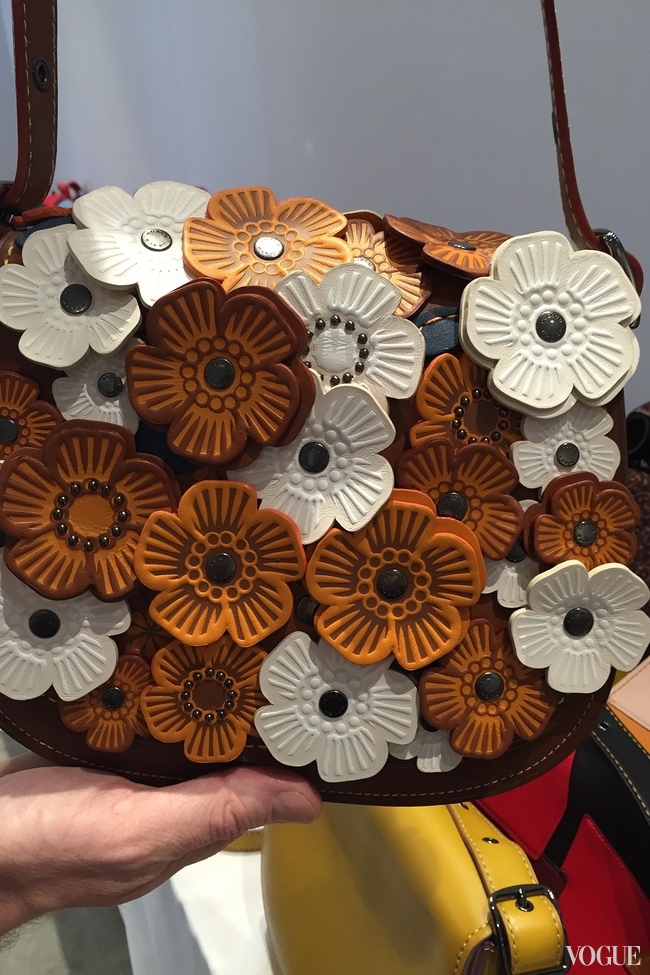 Leather applique flowers on a Coach spring-summer 2016 handbag